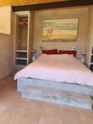 Dormitorio rustico en casa Lucia Luz de Sirius